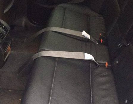Put the back seat back with tether straps coming through the seats