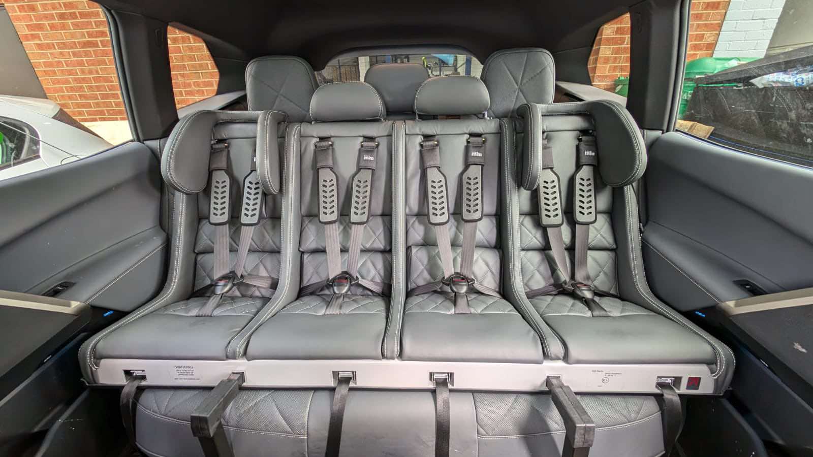 1320 in BMW iX Leather trimmed Multimac in rear of BMW iX trimmed to match grey interior of car